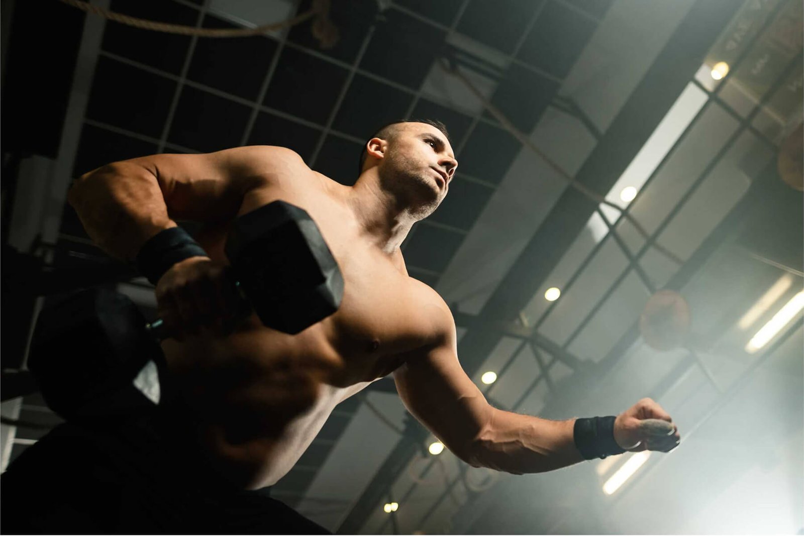 below-view-of-muscular-build-man-lifting-weights-i-TBK47J3.jpg
